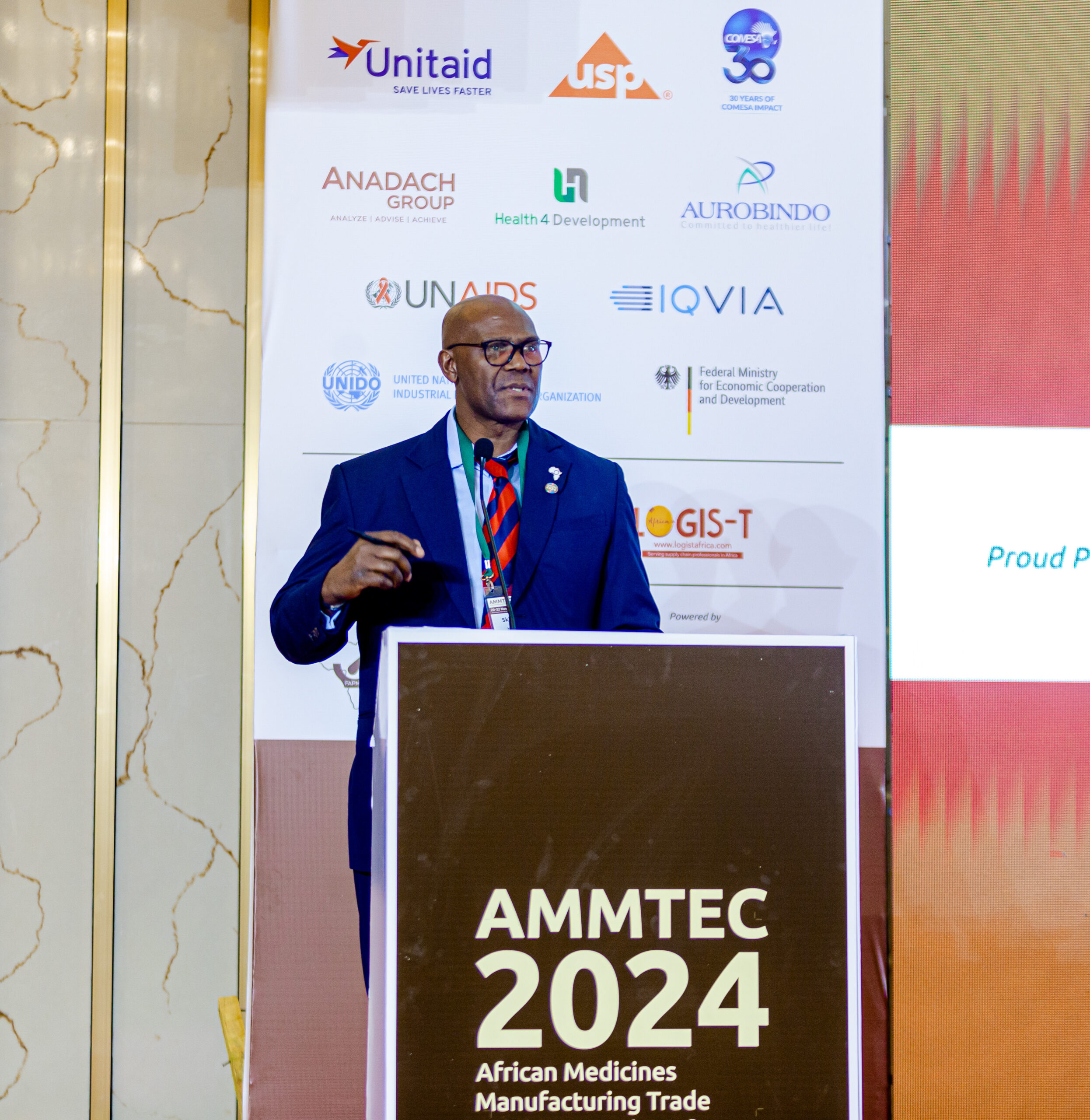 Dr Skhumbuzo Ngozwana, Board Director of FAPMA speaking at AMMTEC 2024's closing ceremony